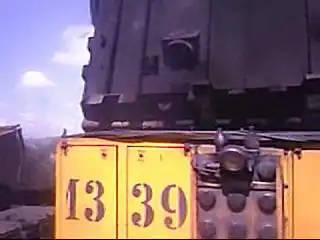 Разгрузка БелАЗ 75148 вид с палубы.