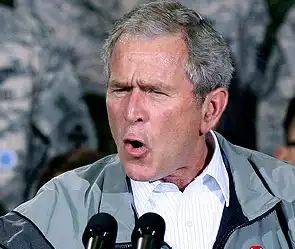 В Иране забросали ботинками портреты Буша