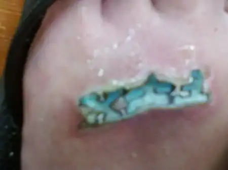 Ну ооочень неудачная татуировка...