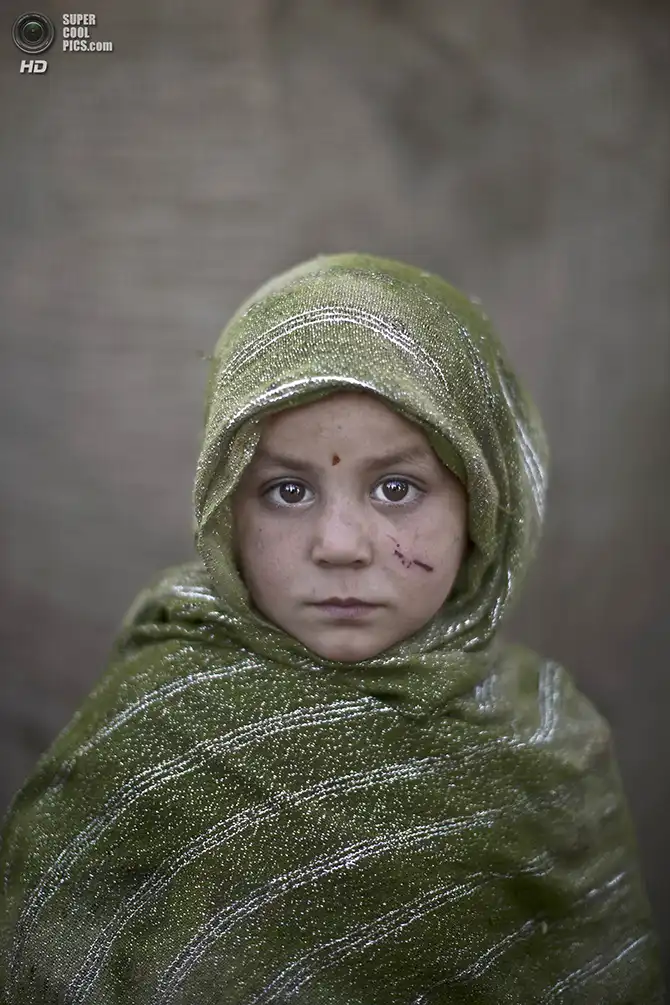 Портреты детей-беженцев из Афганистана