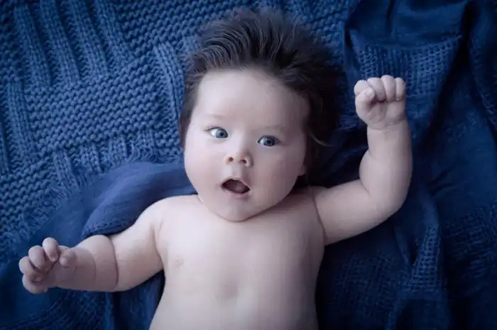 Почему у азиатов именно такой разрез глаз?