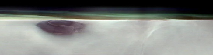 NASA опубликовало фото марсианского вулкана, поднимающегося над облаками